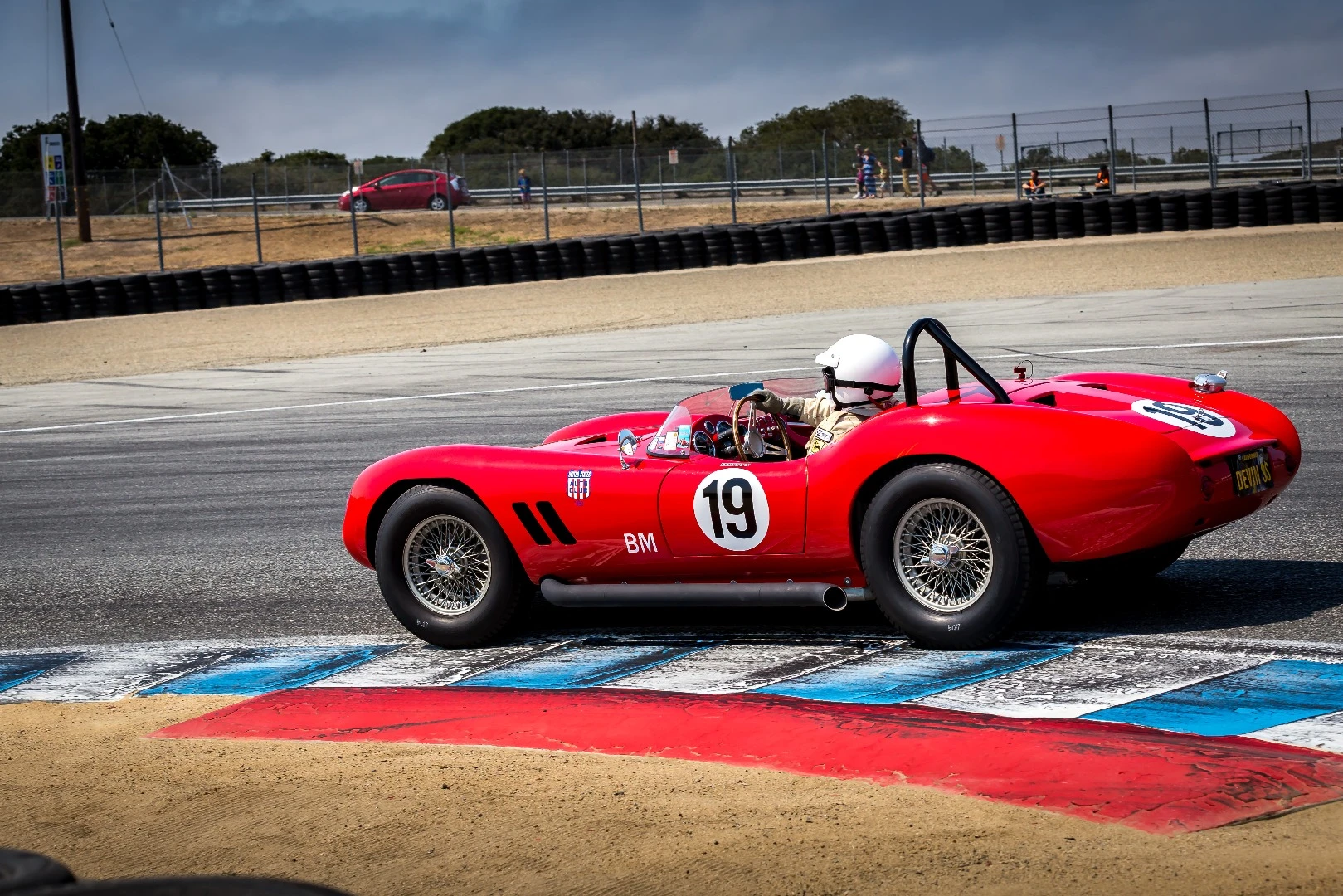 Beautiful lines on this 1958 Devin SS as it cuts the apex on Turn 11