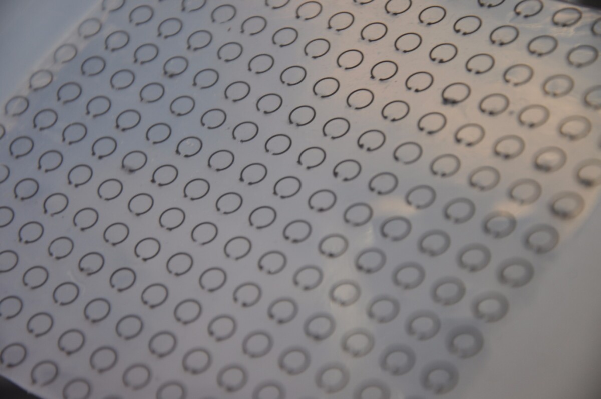 Flexible and tunable meta-skin with rows of split ring resonators