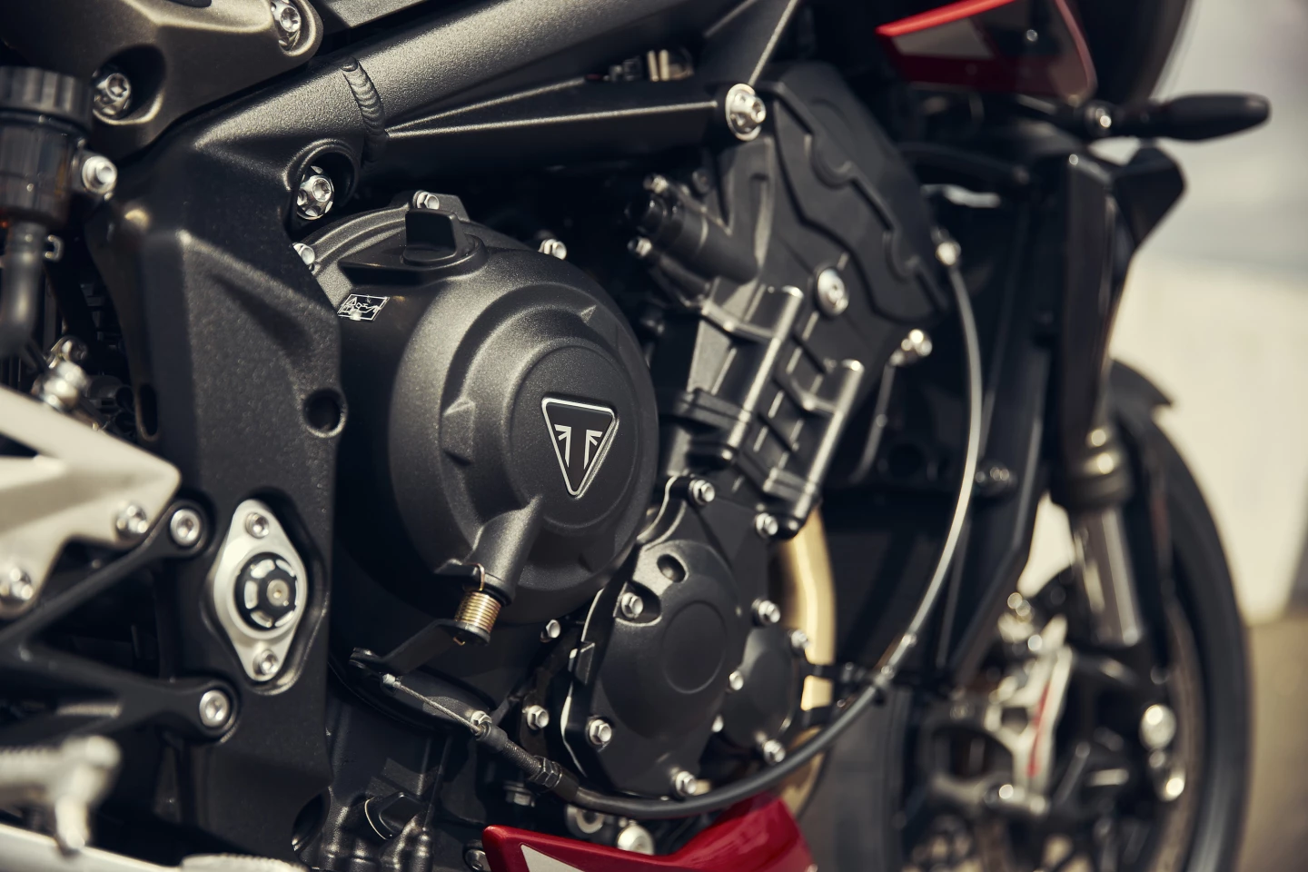 Triumph introduced a lot of changes to the in-line triple engine of the 2023 Street Triple 765 in order to raise its output up to 128 hp