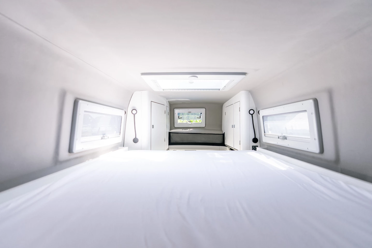 The high roof bed adds an extra 5 cm of width over its Nugget pop-top equivalent, measuring in at 130 x 200 cm