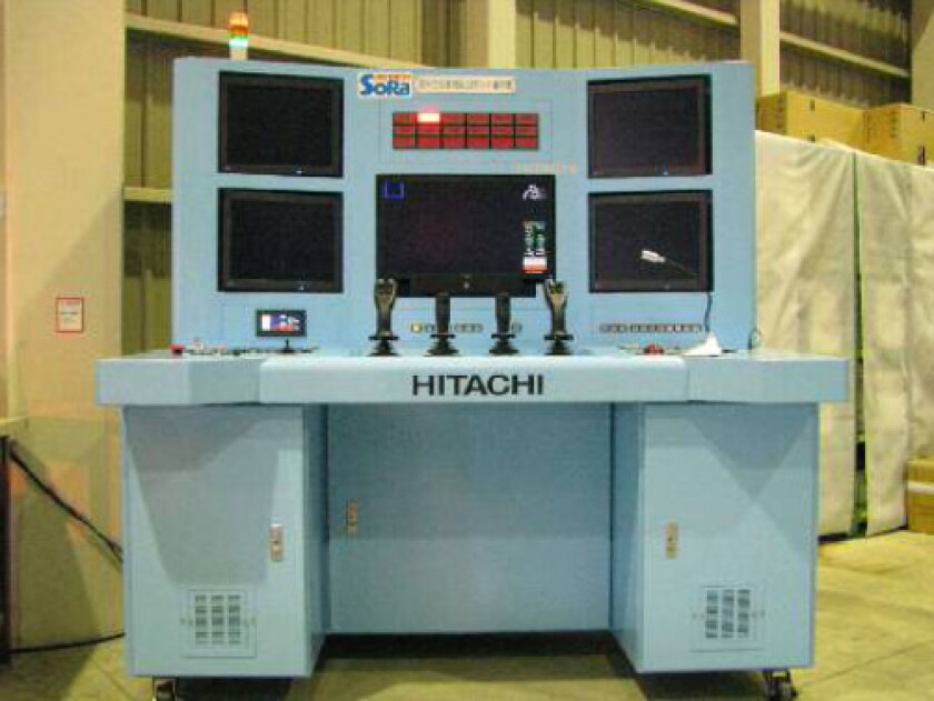 Hitachi's ASTACO-SoRa robot is wirelessly operated at this control station