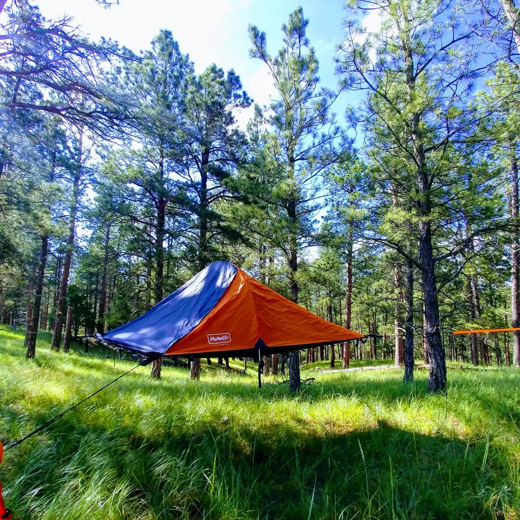 The Bivymok system can be suspended from trees to lift campers off the ground