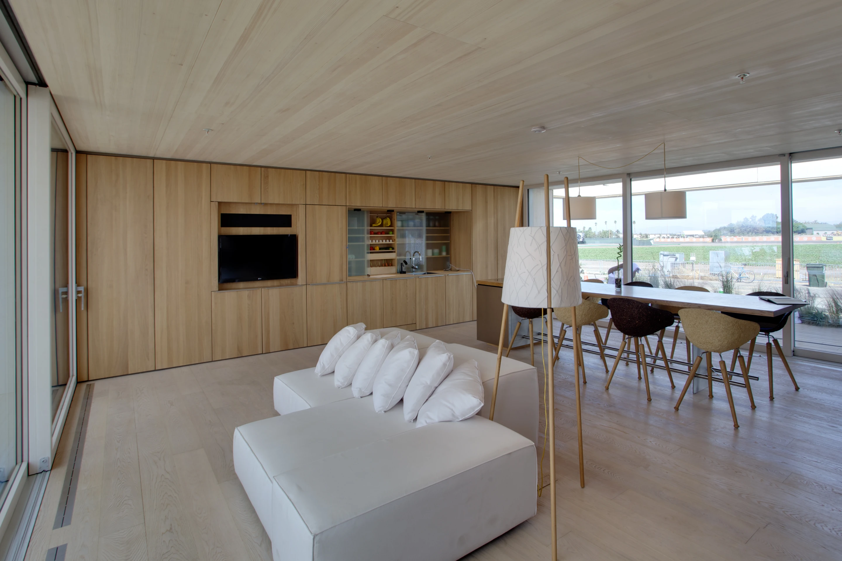 The interior of the LISI house leaves mostly open floor area. Several types of wood were used in the construction (Photo: Jason Flakes (Nomoi)/U.S. Department of Energy)