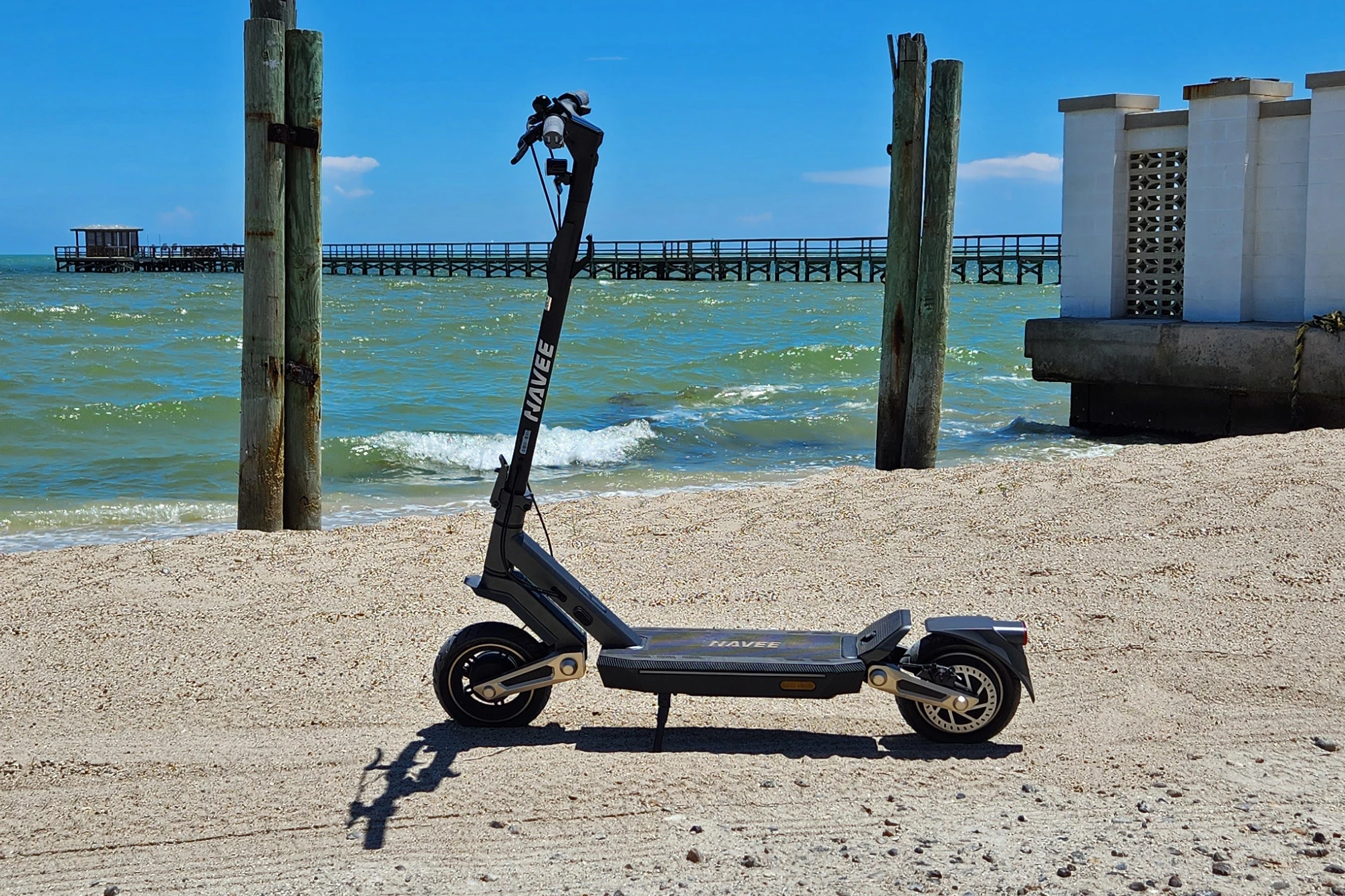 Easy going sand is no trouble for the Navee scooter. Mind you, they're still only 10-inch tires, so I wouldn't go trying to bomb any dunes with it