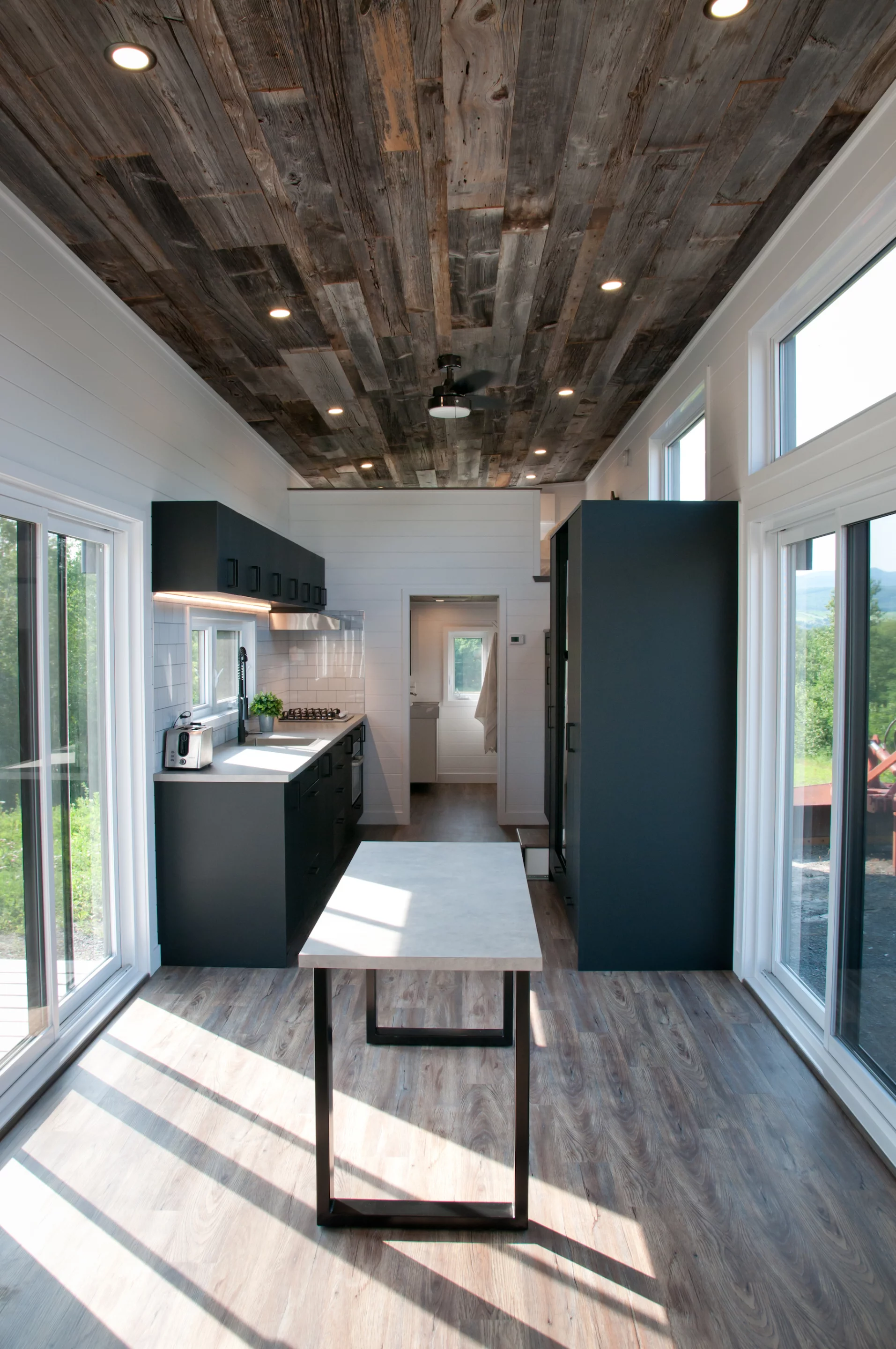The Baobab features two glass doors, one on each side of the house