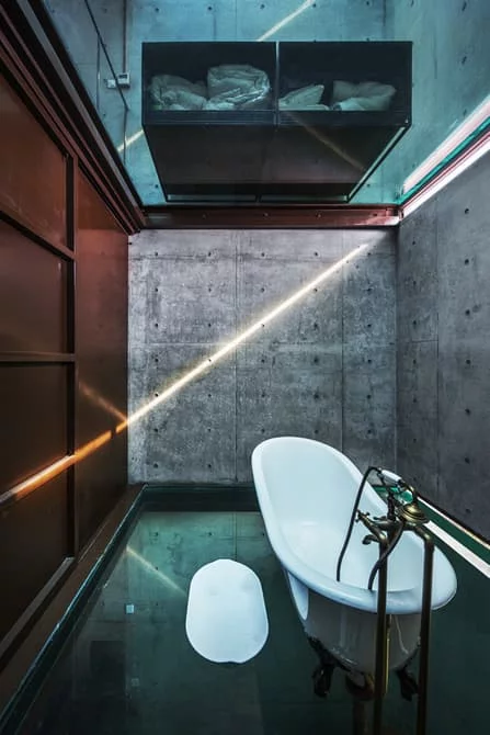 Vertical Glass House doesn't offer much in the way of privacy when taking a bath or going to the toilet