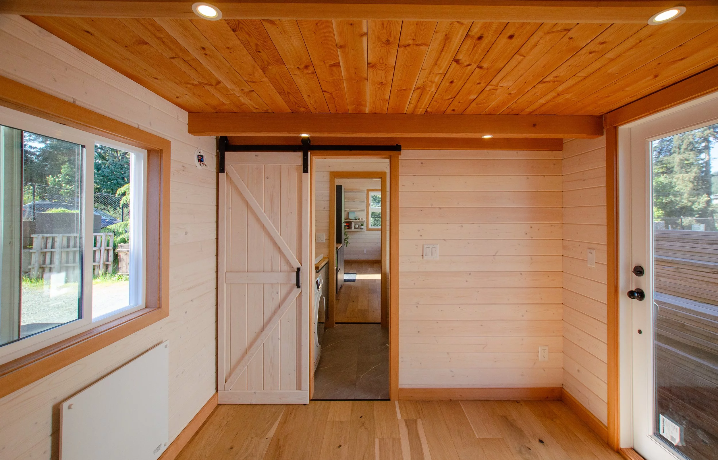 The Juniper's bedroom has its own glazed door offering direct access to the outside