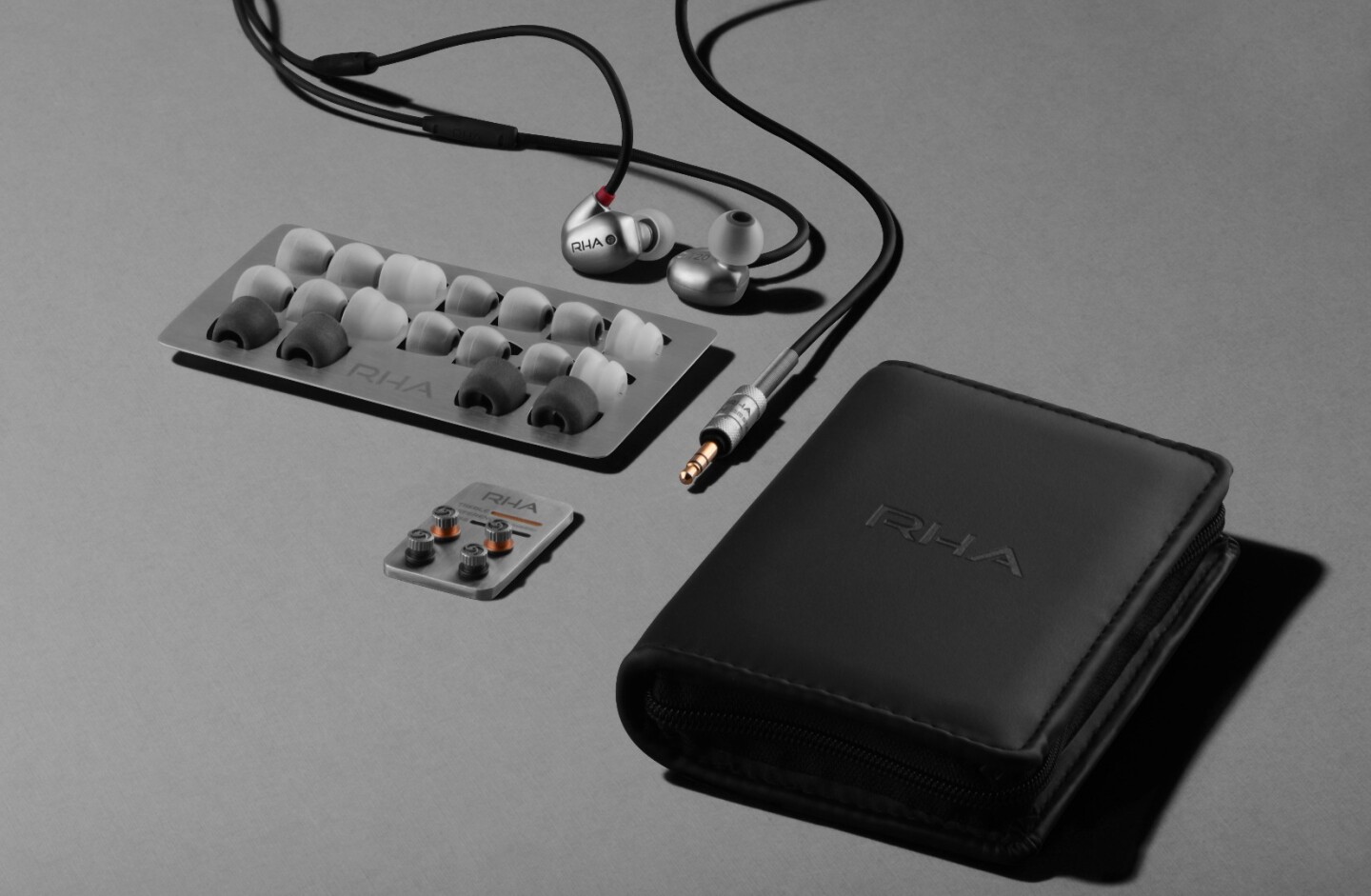 The T20 package comprises a pair of in-ear headphones, silicone and foam tips, three tuning filters and a premium carry case