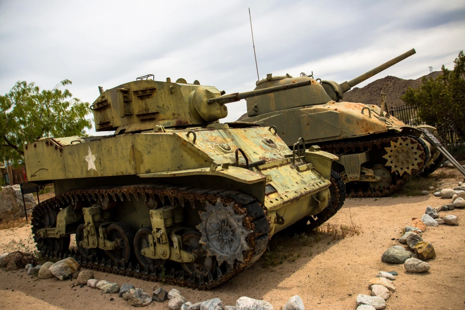 On the left is a Light M5 Stuart Tank. They were built to replace the Light M3 Stuart tank. Their biggest shortcoming was lack of firepower, with only a 37mm main canon. The M4A4 Tank on the right, was better equipped with a 75mm main canon, two .30cal Browning MG's, and a .50 cal MG M2