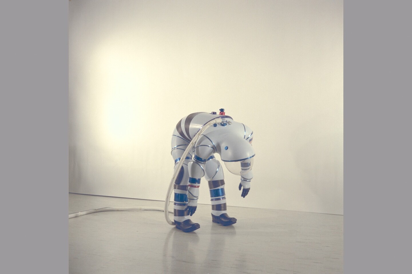 A hard suit showing how far it can bend