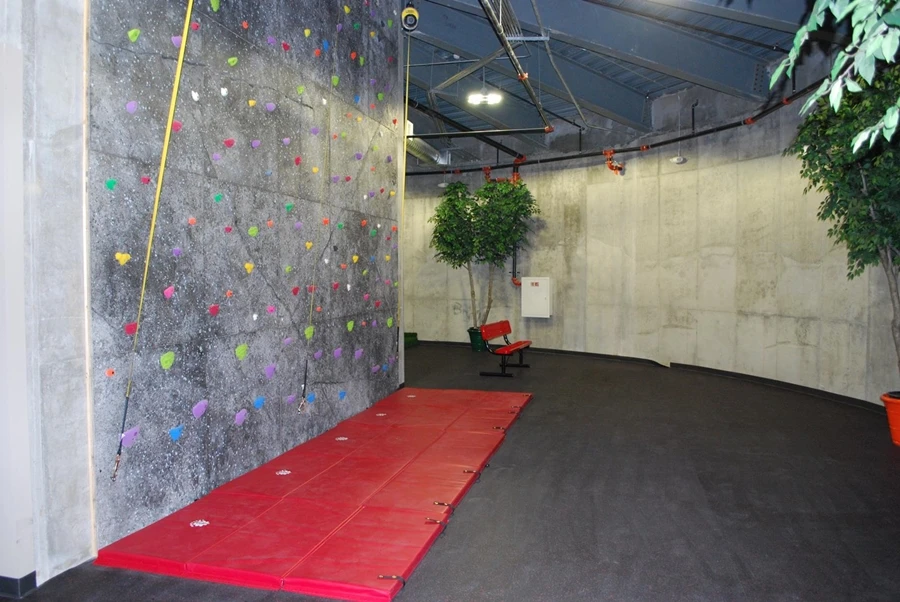 The shelters have a climbing wall