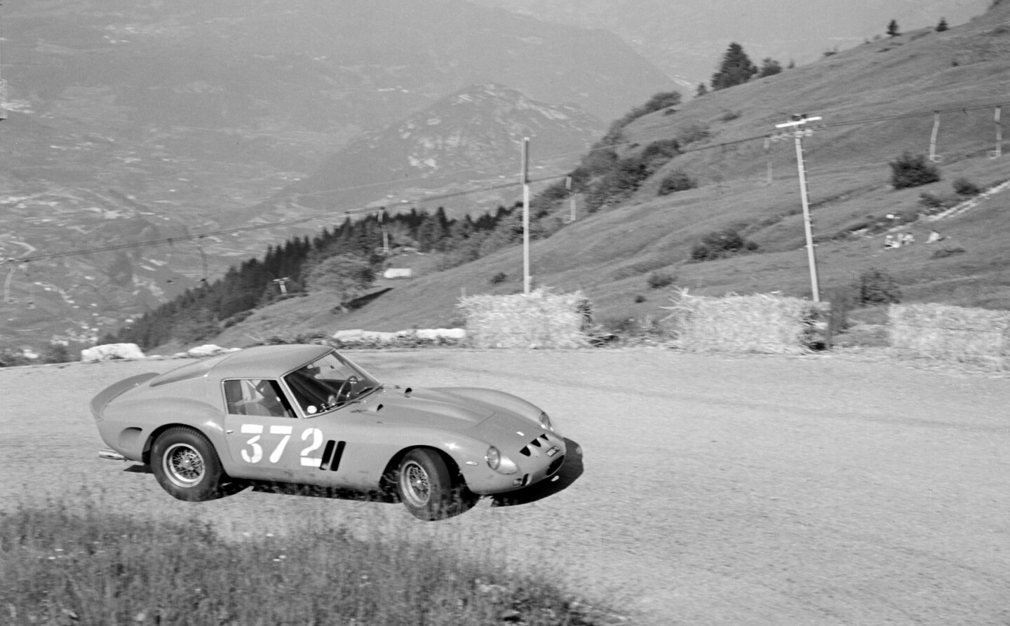 This is the Ferrari 250 GTO that is for sale in Monterey, pictured in period