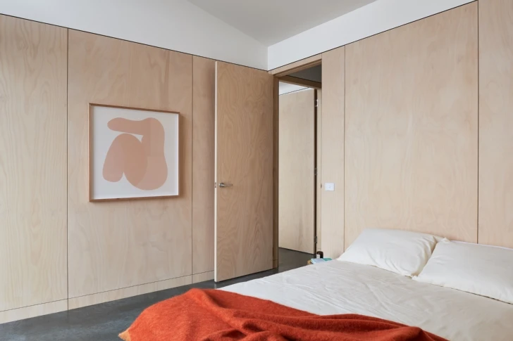 The home features a FSC hardwood clad exterior and polished industrial concrete floors with under slab insulation
