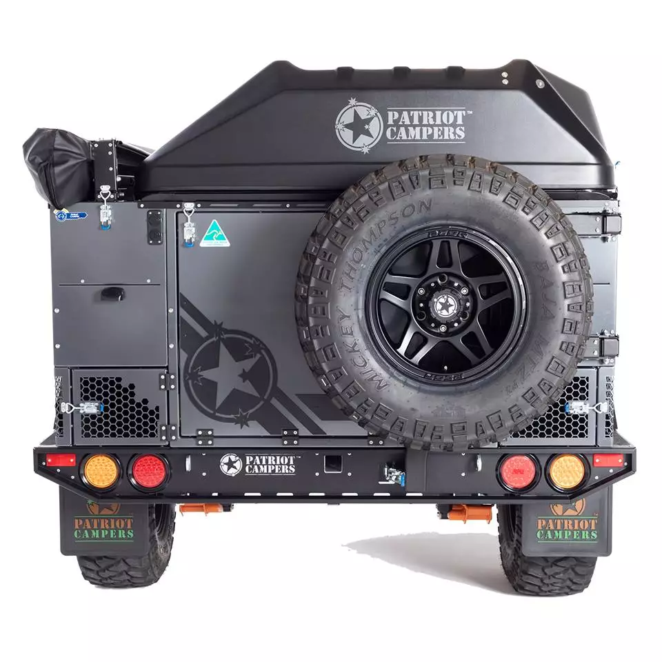 The full-size spare comes standard on a swing-away mount that provides access into the cargo trunk