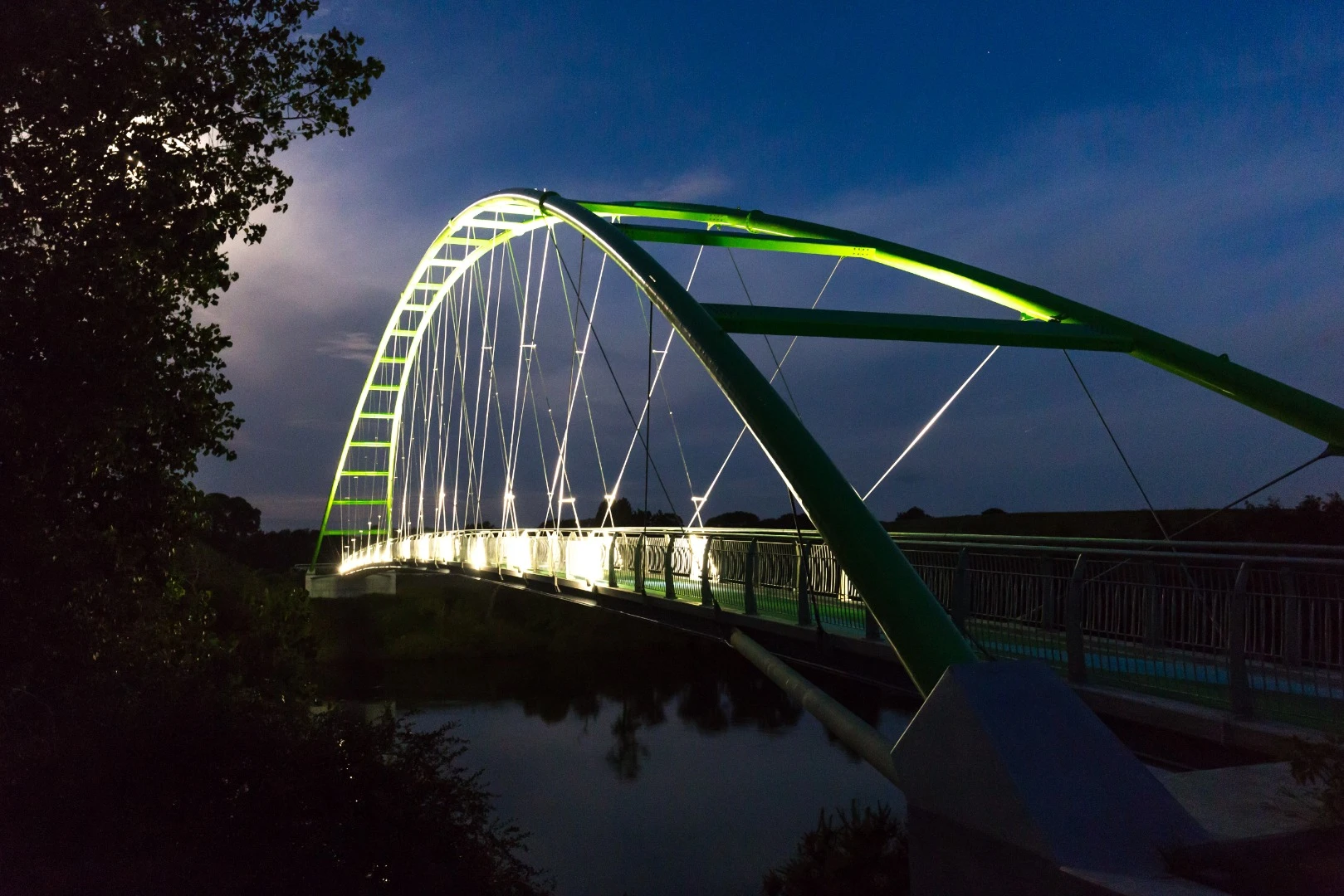 The judges were impressed by the unique way the bridge was launched: "The bridge steelwork was constructed on the bank, cables were tensioned across the gap and the leading edge of the bridge was drawn across, sliding on skids on the cables. This most ingenious method only took two hours and a tracked excavator to get the bridge in place."