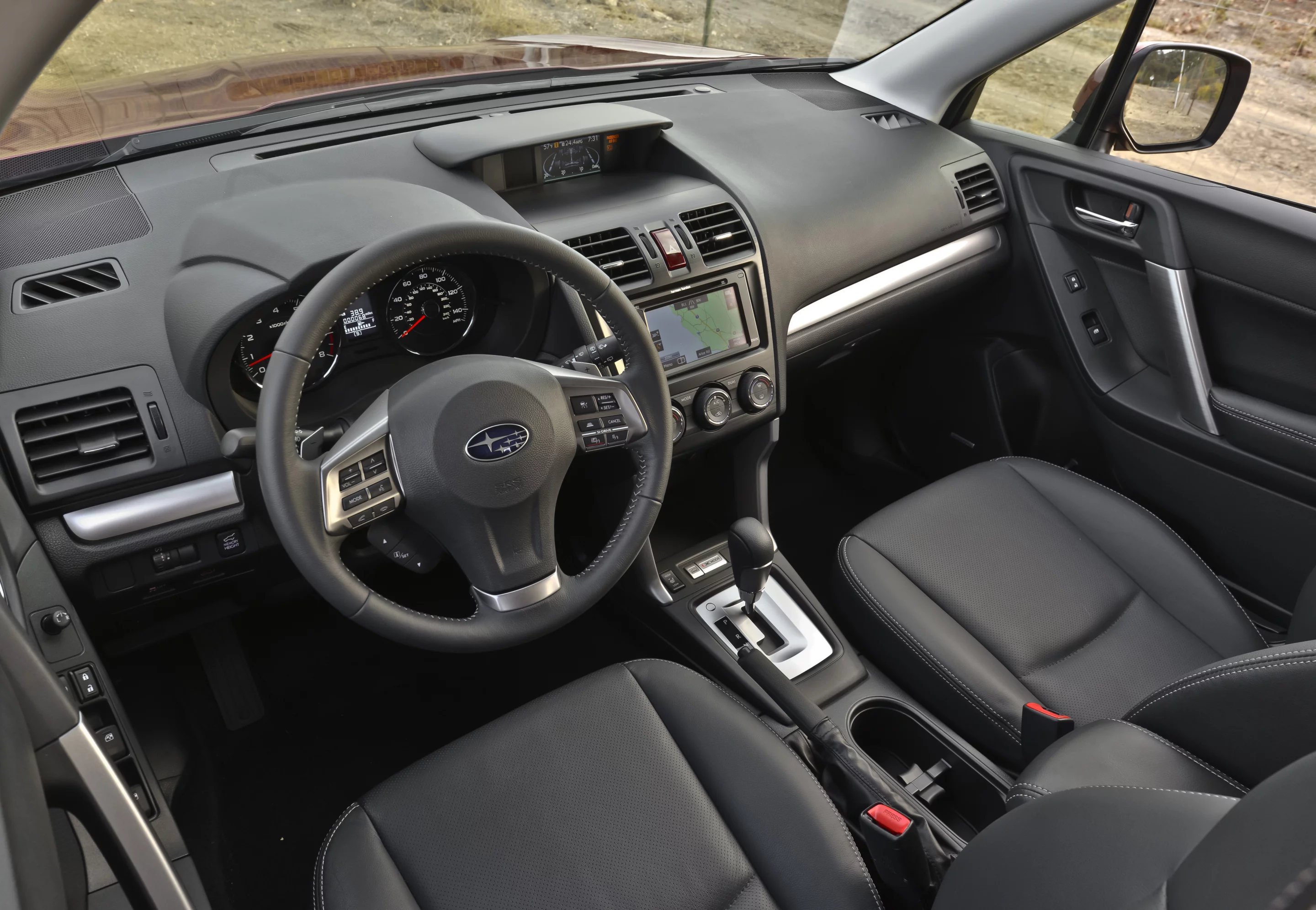 Interior equipment on certain models includes leather-trimmed seats and a rear-view camera