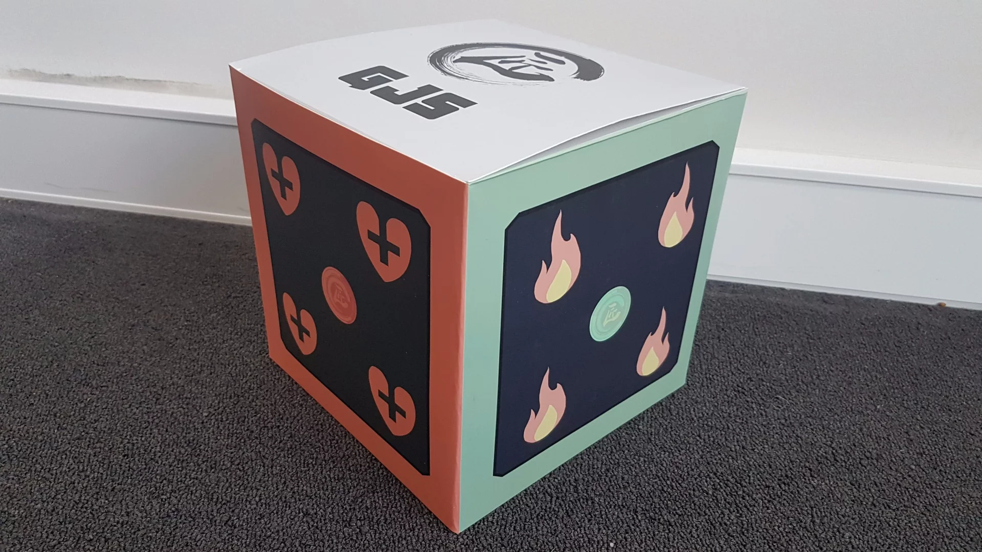 Geio comes with several "totems," boxes with special patterns on the side that the robot can scan and recognize