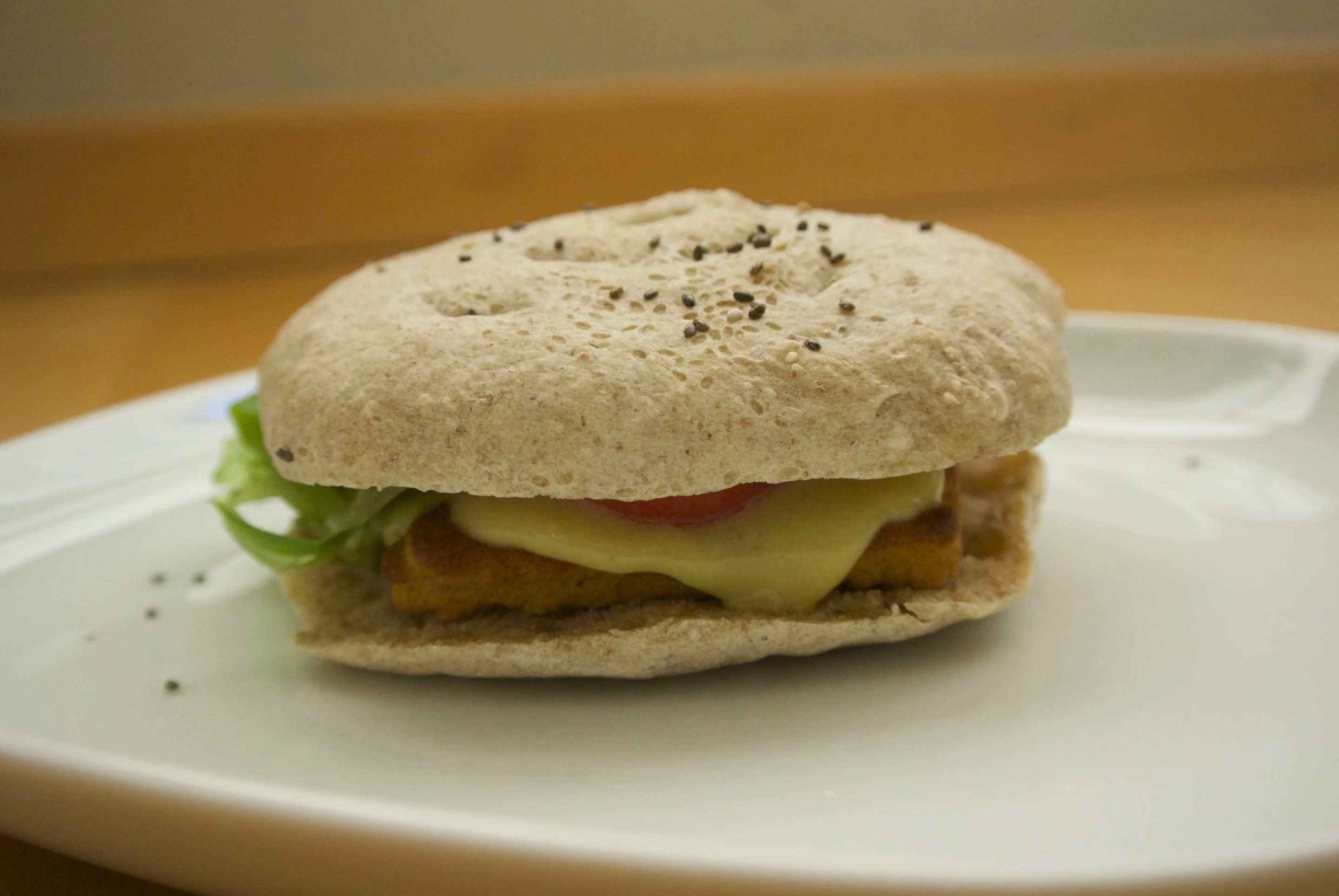 Foodini preps the hamburger, cheese, and bun for a complete hamburger