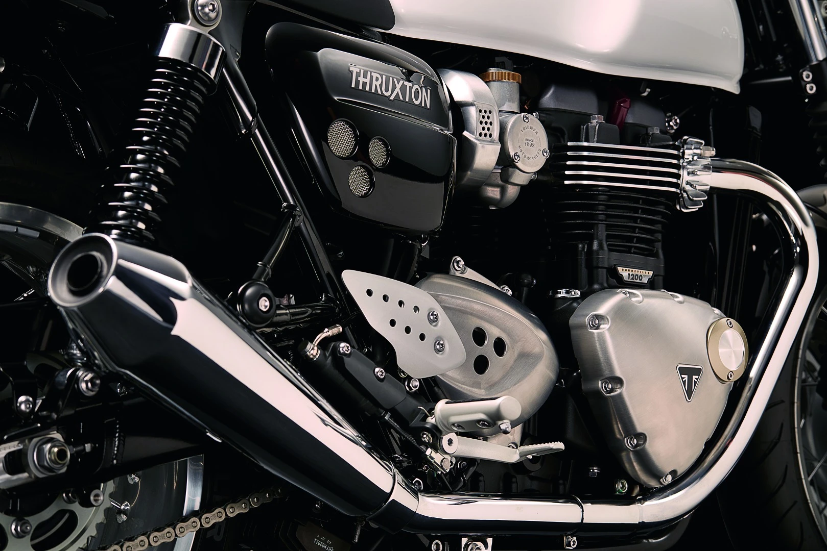 Triumph designed a new Bonneville twin-cylinder engine that successfully conceals its liquid cooling behind classic looks