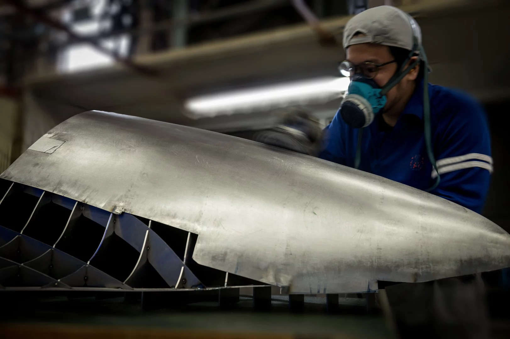 Infiniti goes to work on the body panels of the Prototype 9