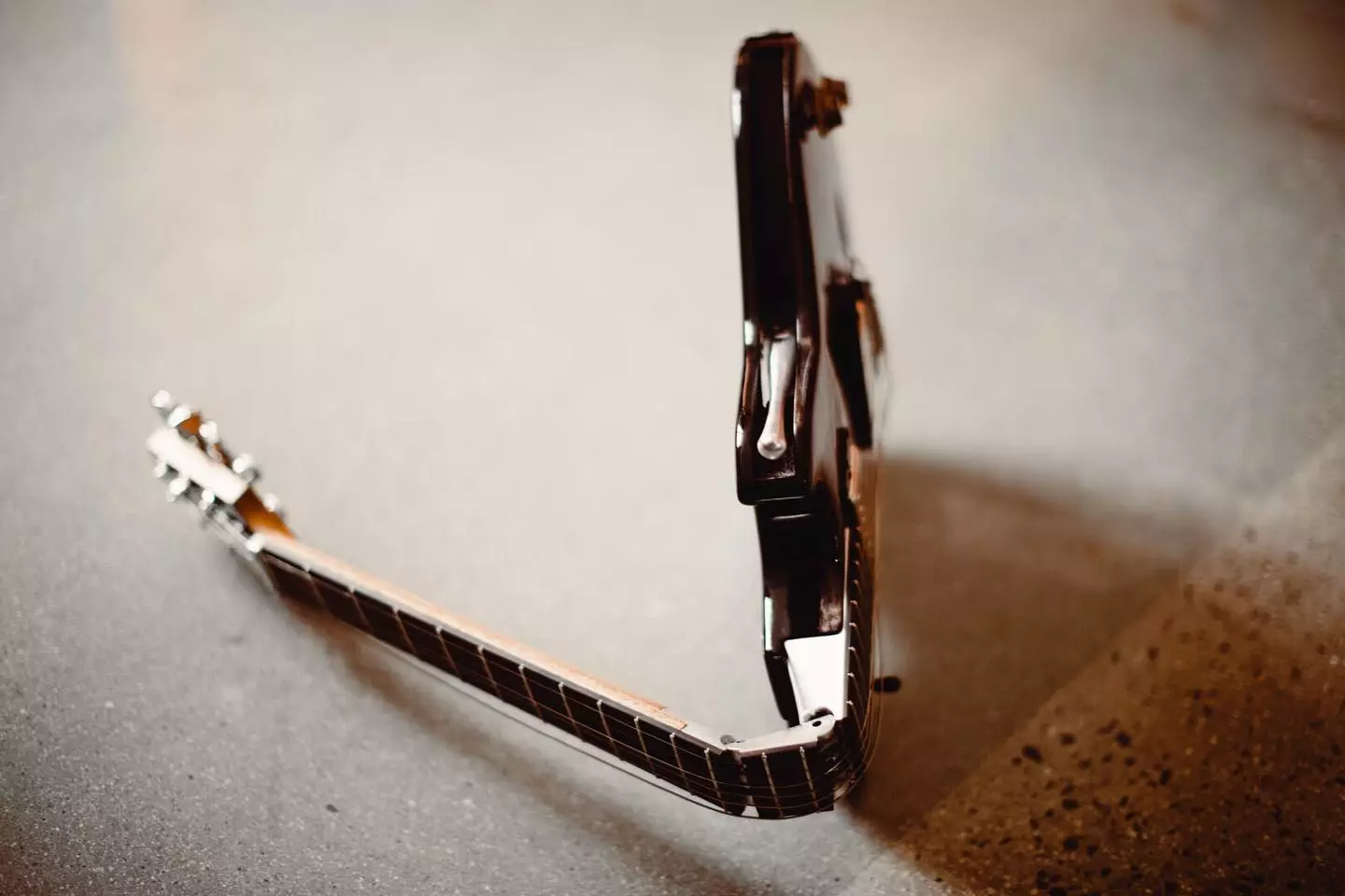 A patented mechanism inside the Ascender unlocks the neck and loosens the strings for travel