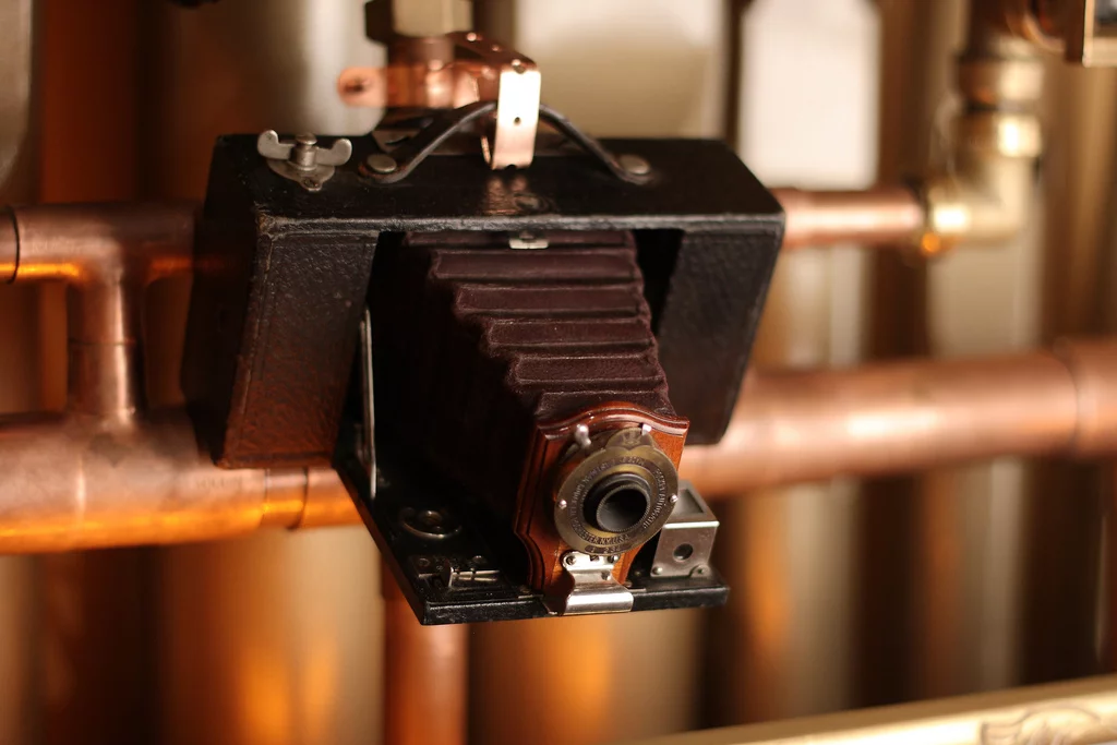 A Microsoft LifeCam Cinema 720p HD webcam stripped down and fitted into an antique Brownie box camera