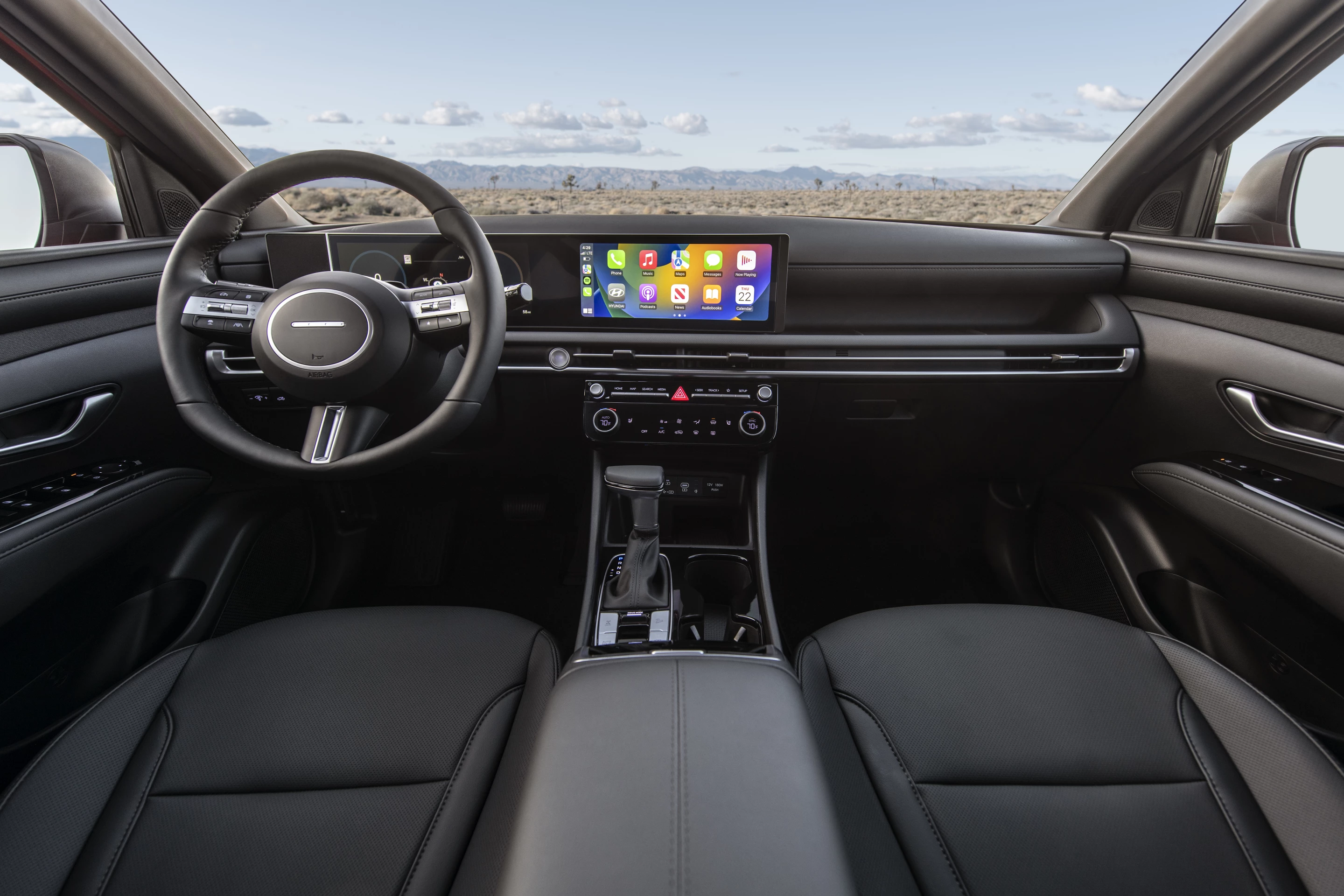 The interior of the 2025 Hyundai Santa Cruz has a new, combined display screens format
