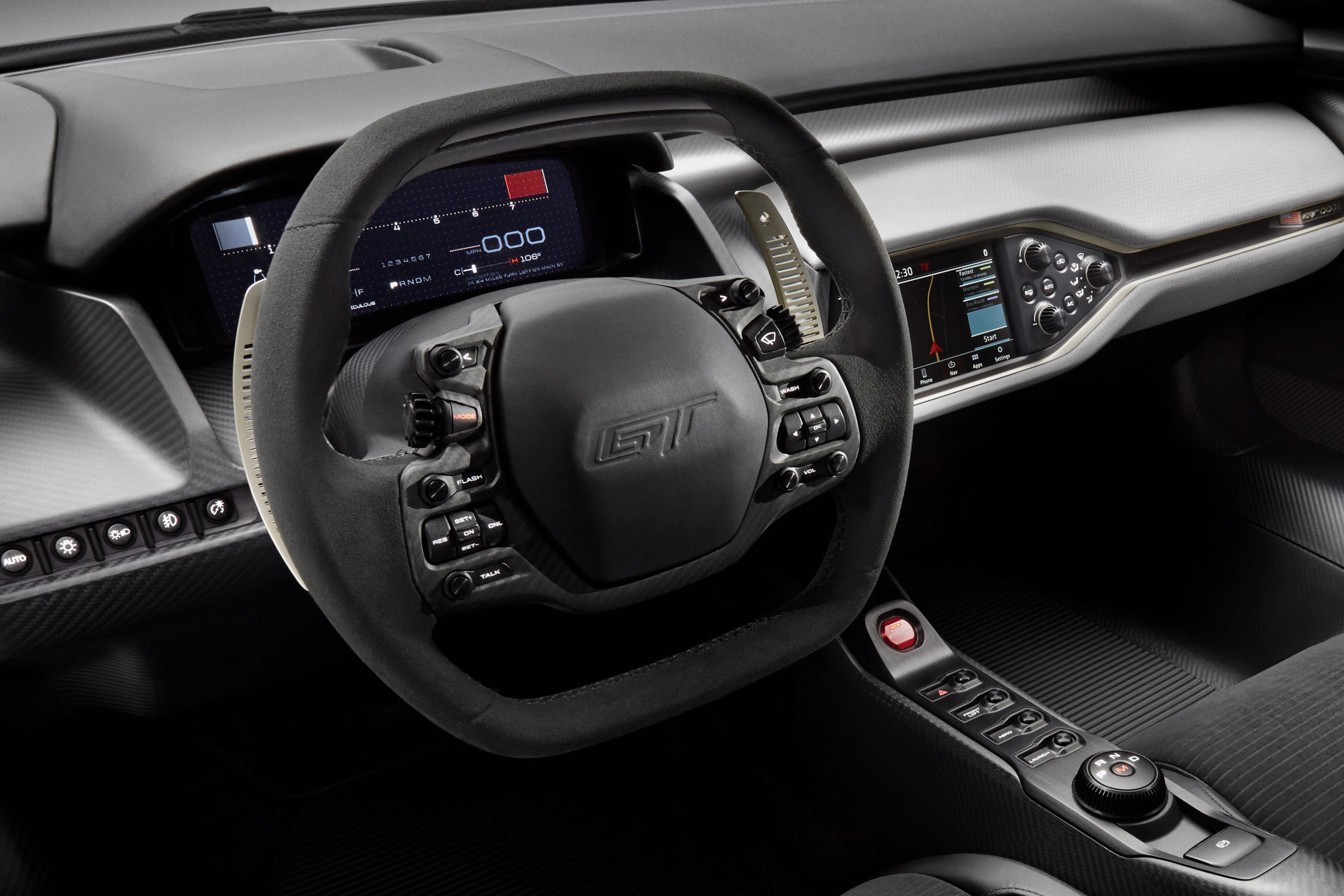 An F1-style steering wheel integrates all necessary driver controls, creating a stalkless steering column that allows uncluttered access to the transmission paddle-shift controls. A fully digital and configurable instrument cluster provides a wealth of driver-focused data. The display is configurable for multiple driving environments and different driving modes.