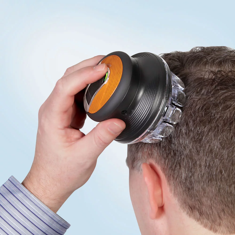 The Single Handed Barber uses a rotary system to allow users to cut their own hair evenly with one hand