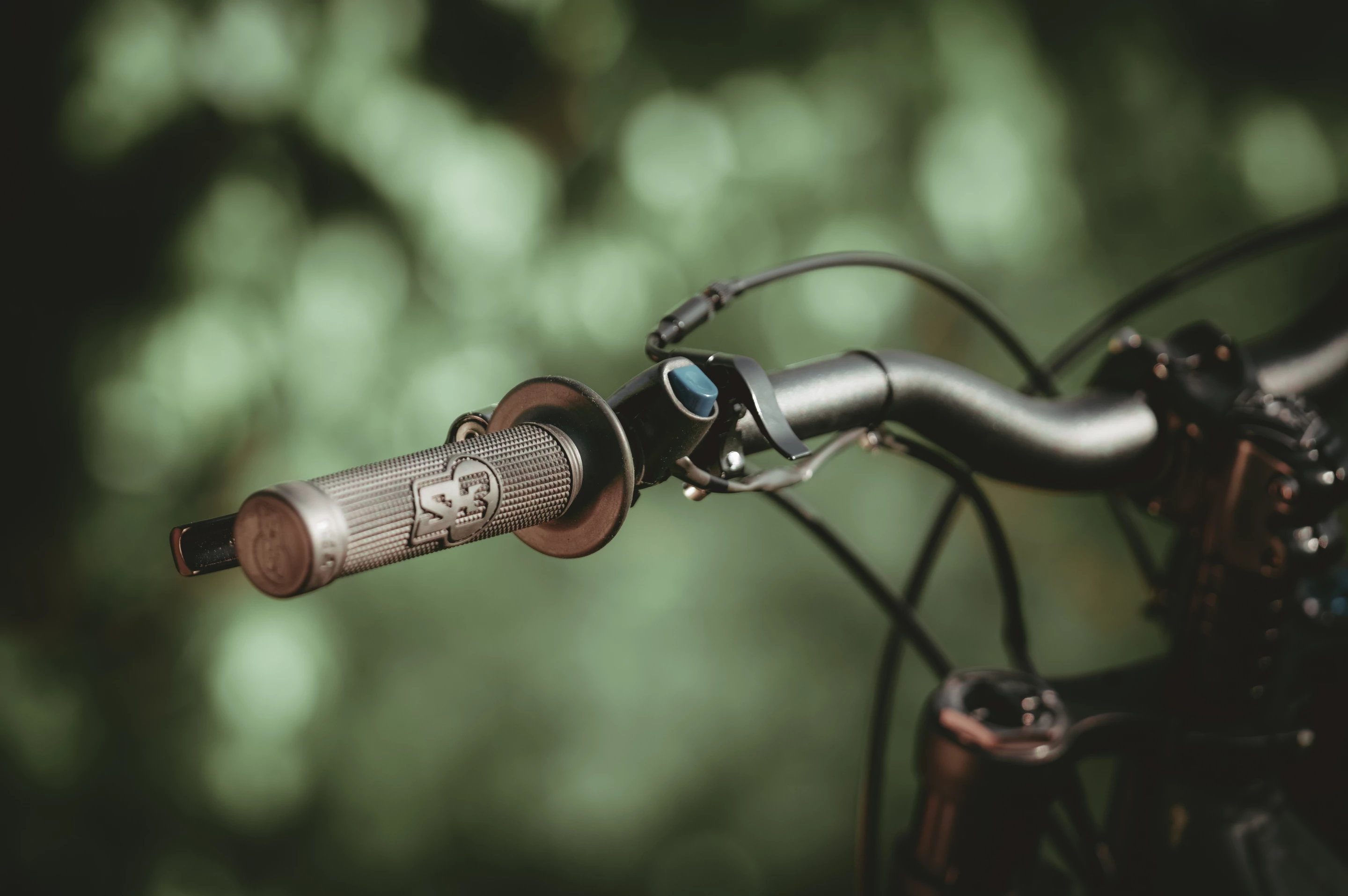 The Kuberg Ranger has a twist throttle and regenerative braking button