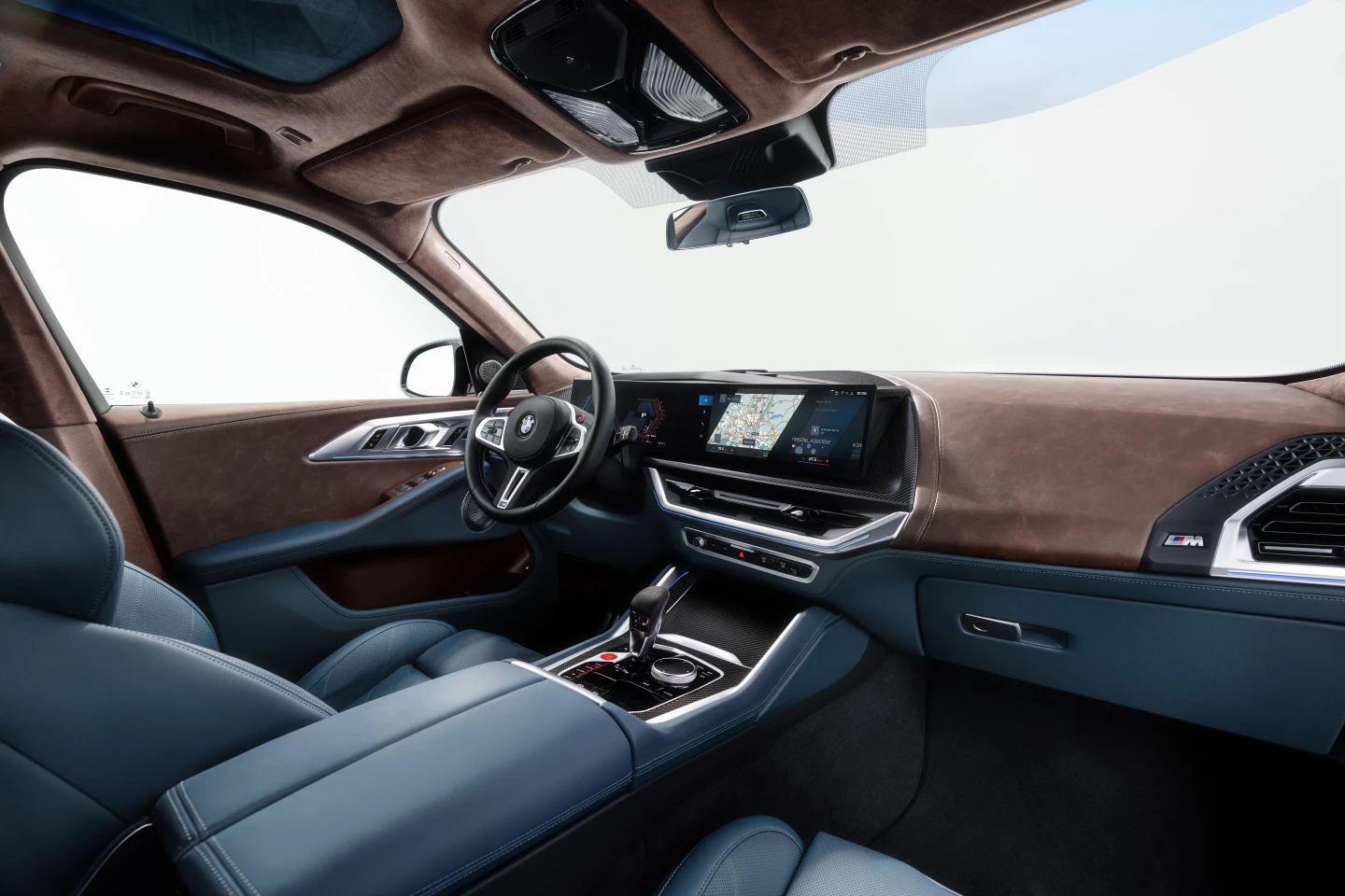 BMW's curved display houses the digital instruments and infotainment screen in one large body