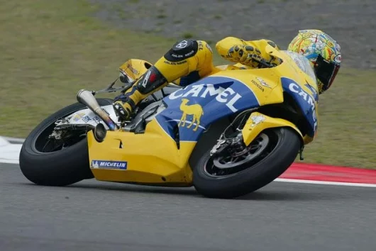 Alex Barros dominated practice but the wet weather. Seventh in the early stages, his race was ruined by a ride through penalty.