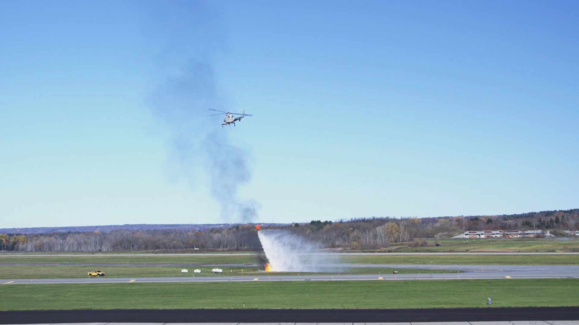 K-MAX dropping water on a fire