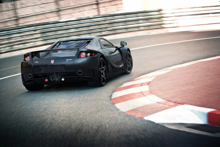 A GTA Spano rounding a curve on the Monaco SP course