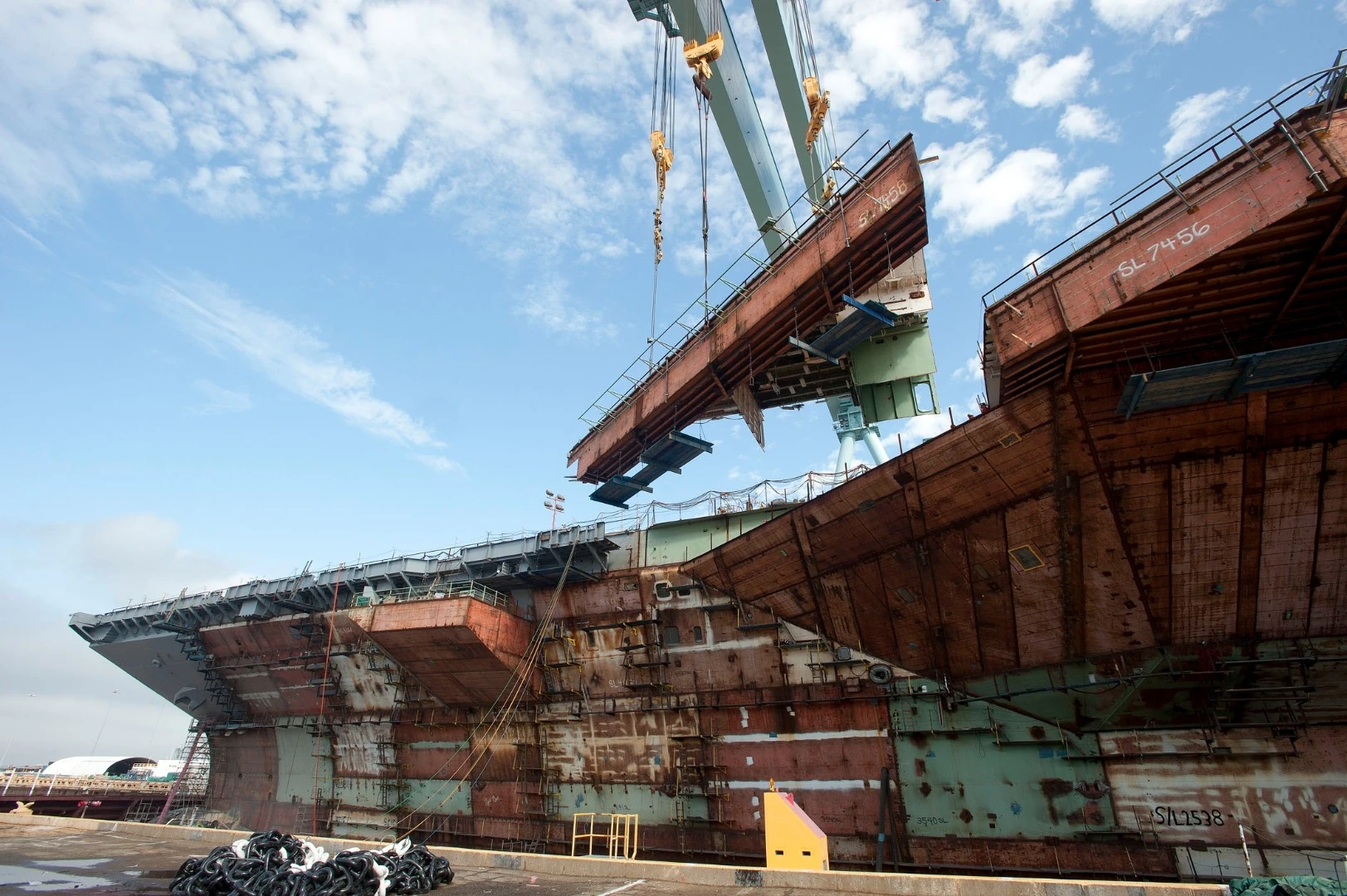 A section of the Gerald R Ford being lifted into position