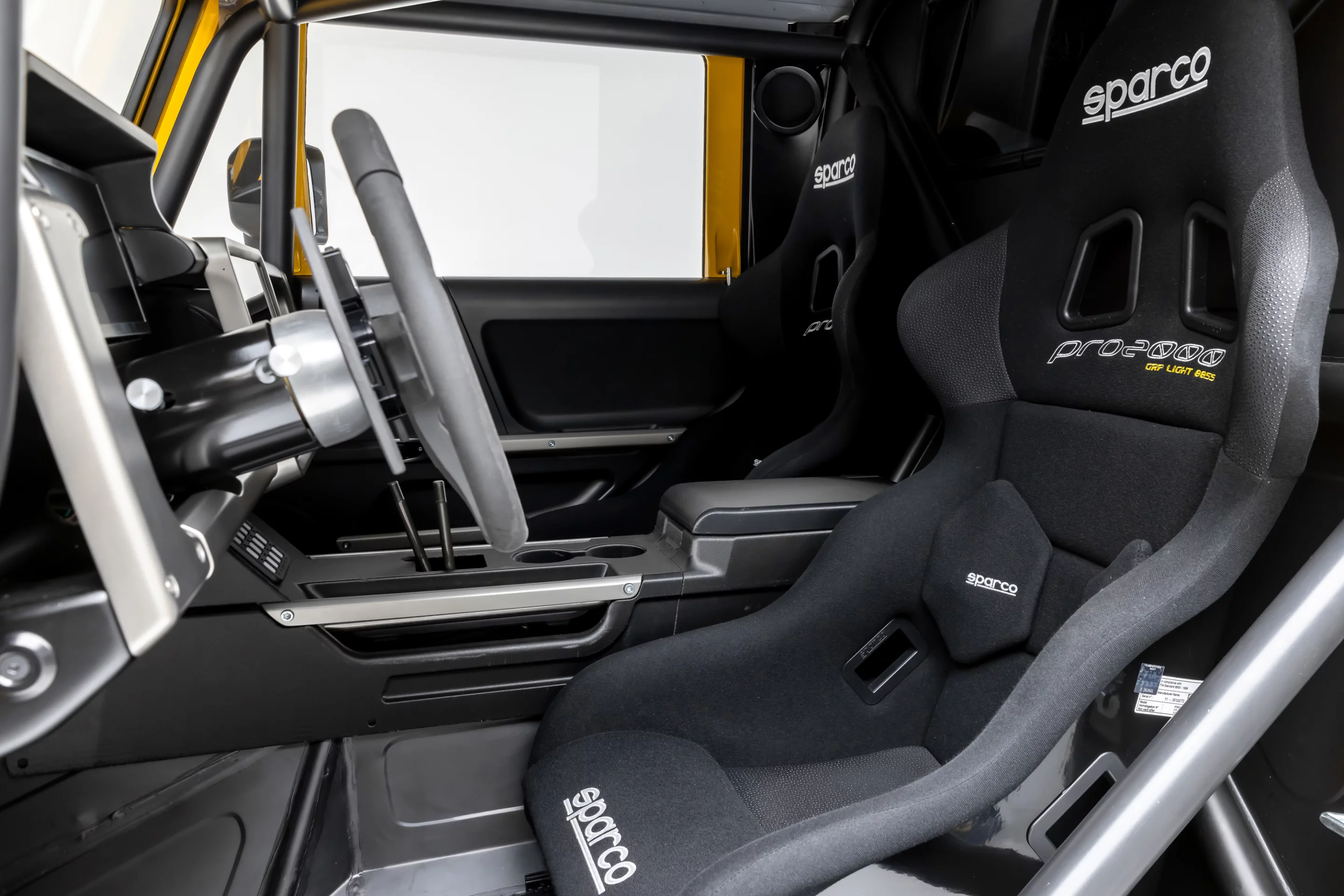 Built for speed, not comfort - though the interior is home to two bucket seats and some conveniences (such as aircon and heating)