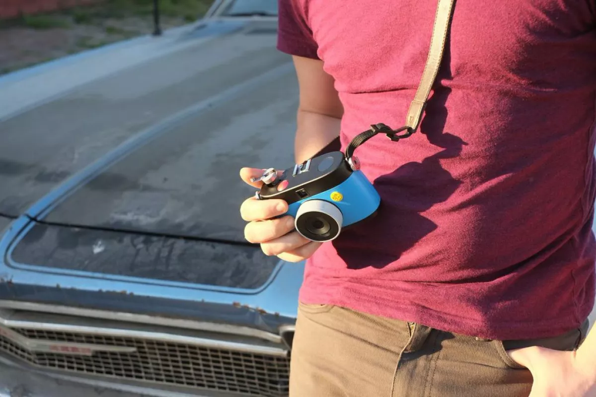 The Otto camera features a crank that can be popped out from the top and turned to instantly capture animated GIFs