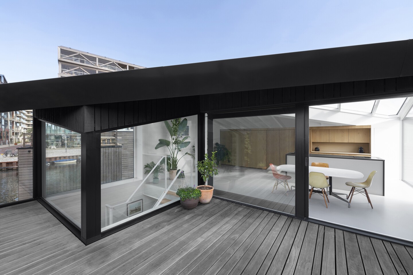 Floor-to-ceiling glass windows are a big feature of this home