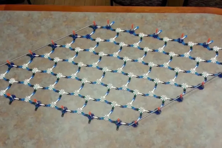 A new metamaterial, recreated here using K'Nex, can change its softness and hardness in response to low-level stress