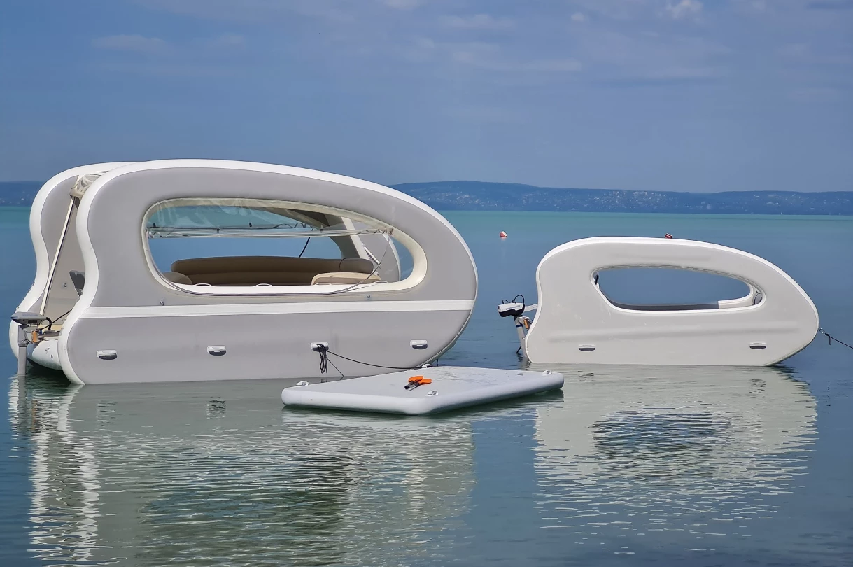The Portless Catamaran Deluxe and Portless Catamaran pose with DDD's third product: the €1,590 Portless Beach inflatable swimming/sunbathing platform