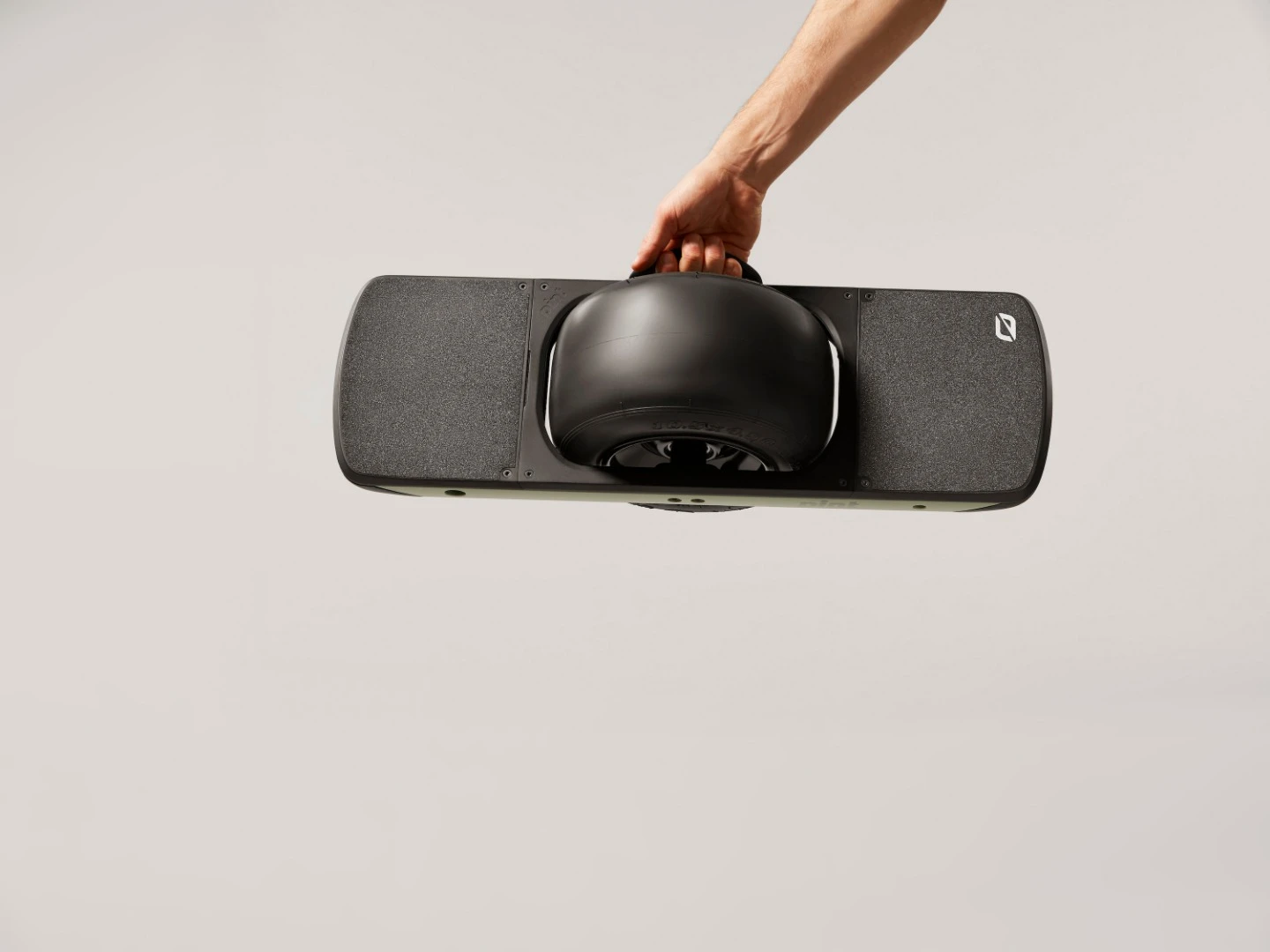 Firsts for the new Onewheel model include a fold-out carry handle to lug the 23-lb (10.4-kg) up stairs or onto a bus