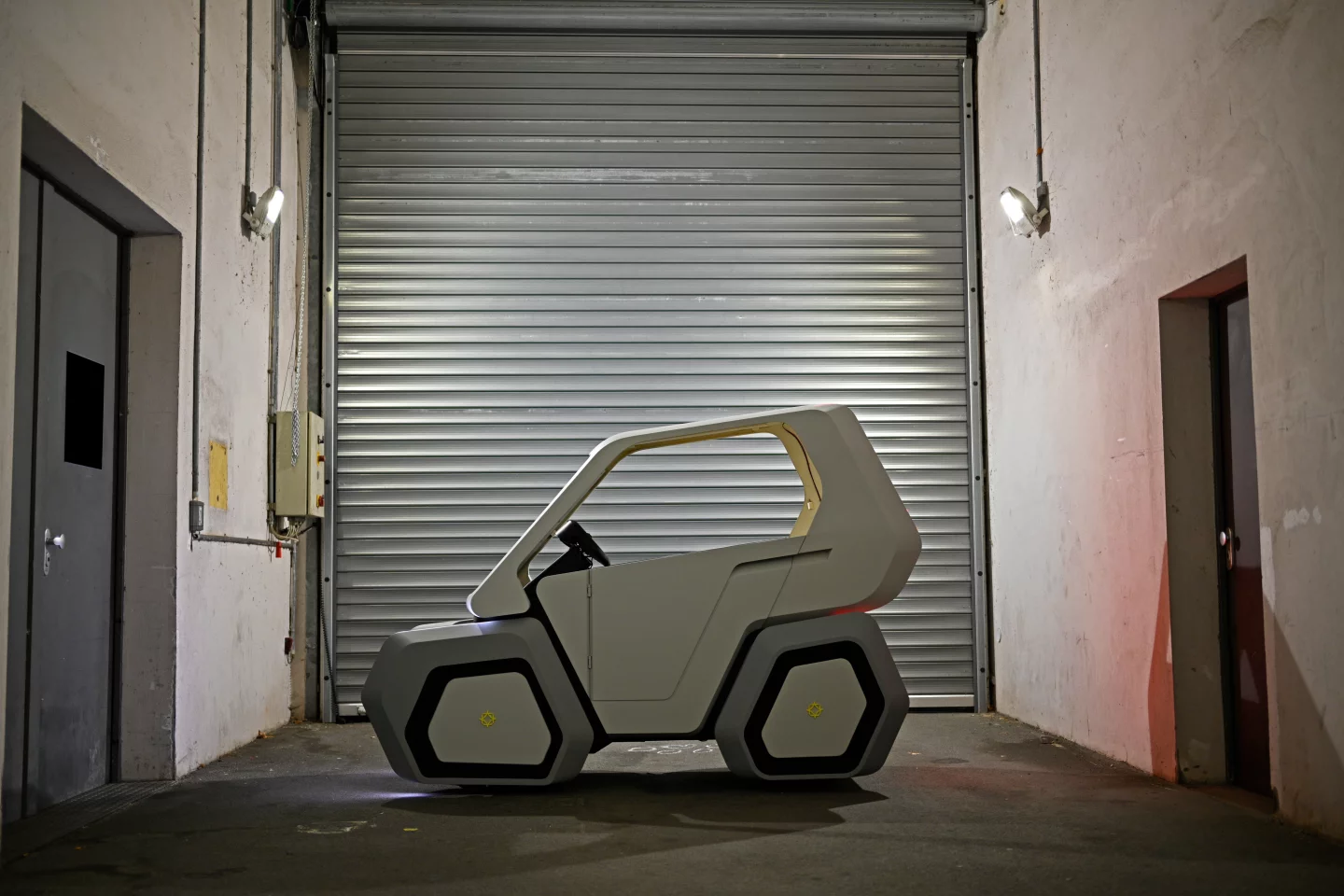 The UILA four-wheeled electric commuter has a top speed of 25 km/h and a range of up to 70 km per charge