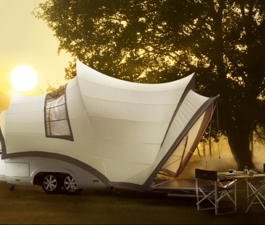 The Opera camper trailer has every conceivable luxury: electrically-adjustable beds, hot and cold water, ceramic toilet, LED lighting and a mobile hob and barbecue for cooking outside