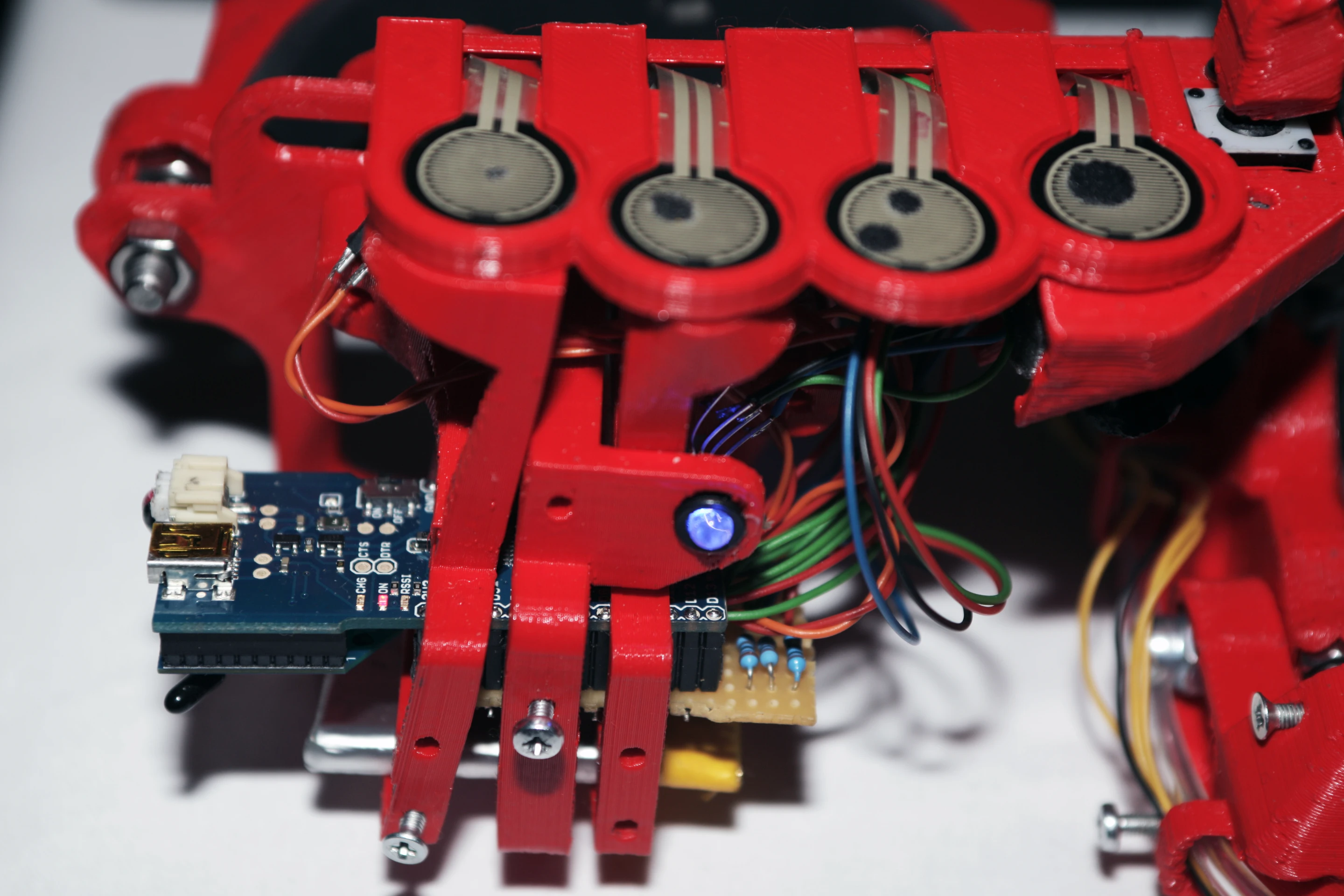Each of the 3 units uses an Arduino Fio running Firmata to interface with the sensors, and XBee Series 1 wireless transceivers for communication