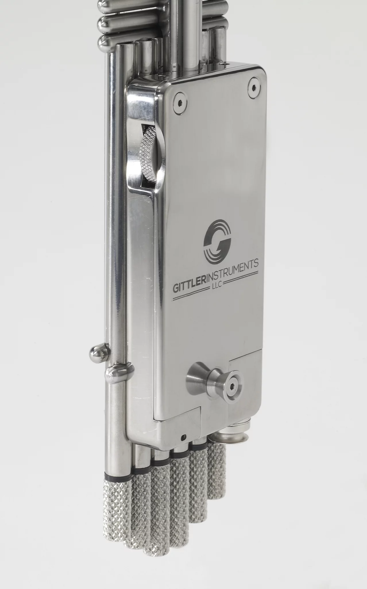 The small E-Box at the back of the instrument has a volume wheel and a pair of assignable tactile buttons