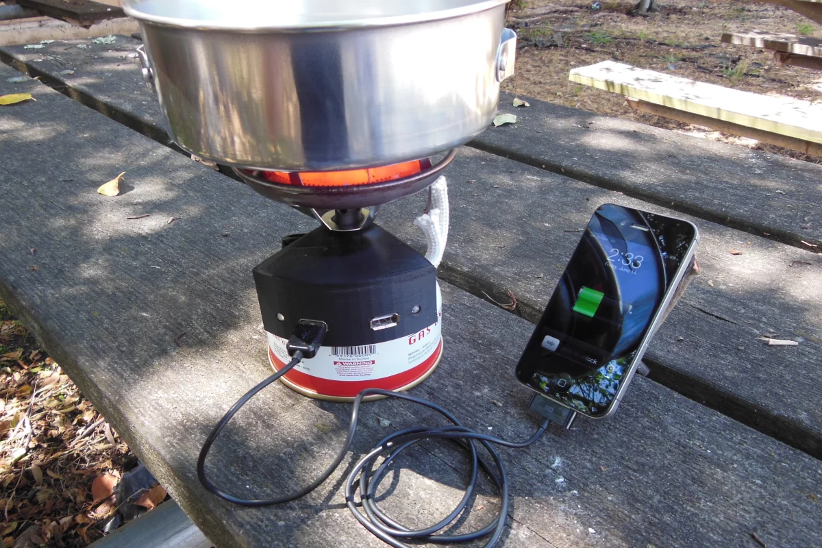 The Halo is a backpacking stove with built-in fuel cell charger for charging mobile devices