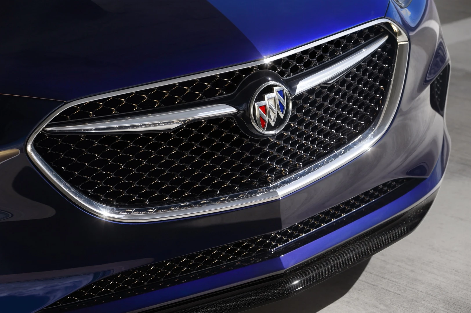 Buick's new winged tri-shield insignia rests atop 3D mesh