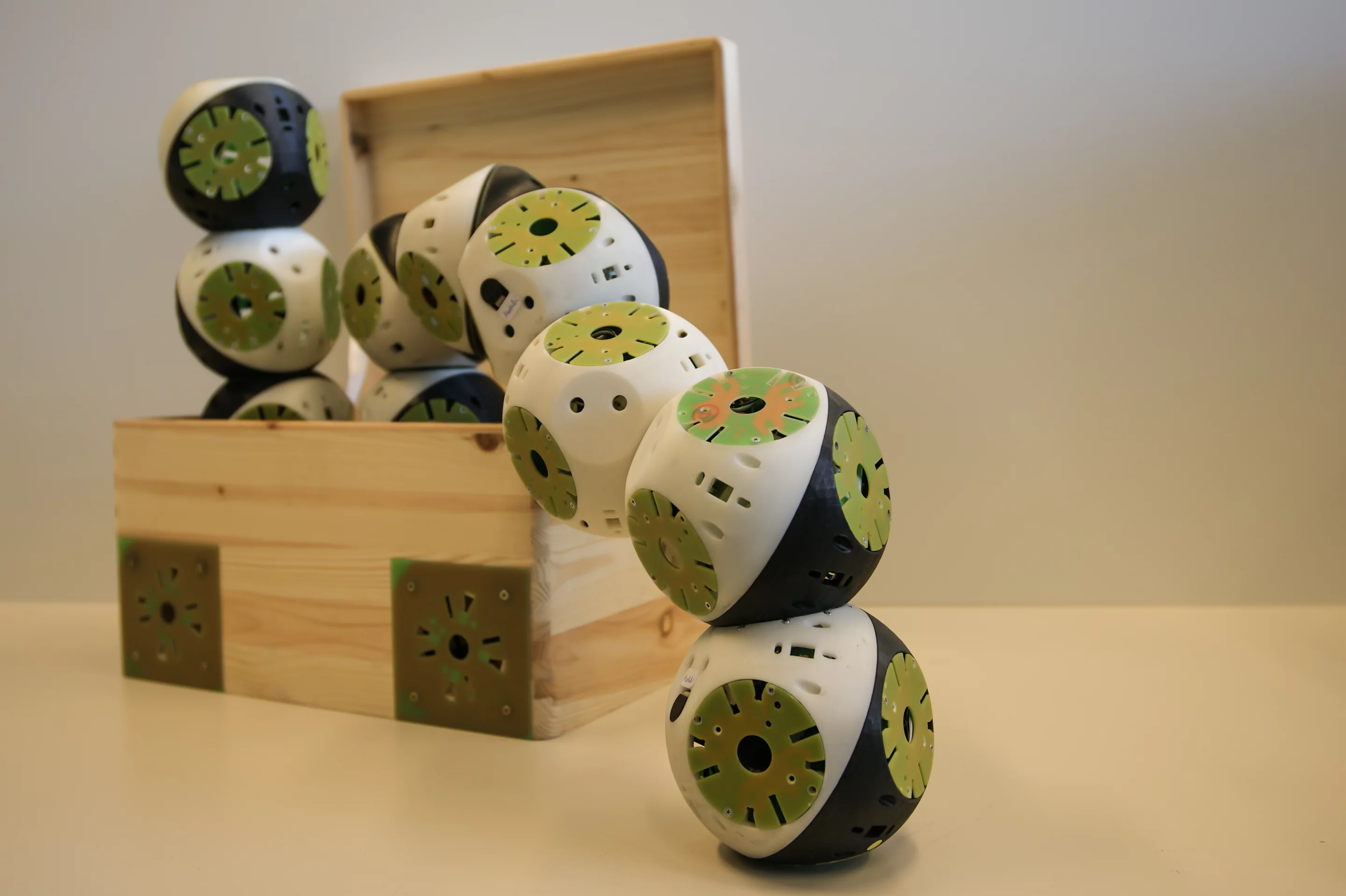 Roombots modules coming out of a storage box (Photo: Biorobotics Laboratory, EPFL)