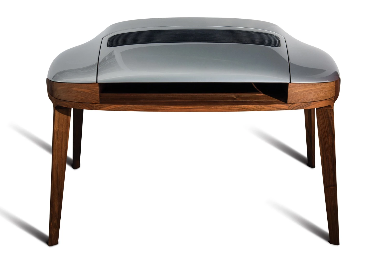 The Porsche Writing Desk features two small drawers on either side of the center writing space for extra storage