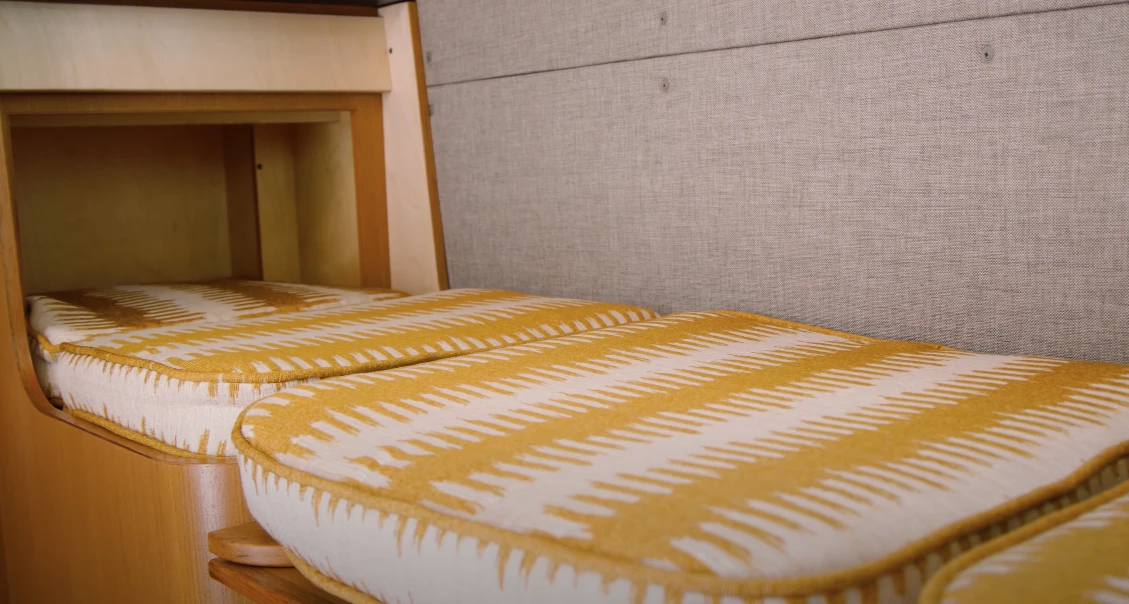 The dinette folds into a single bed